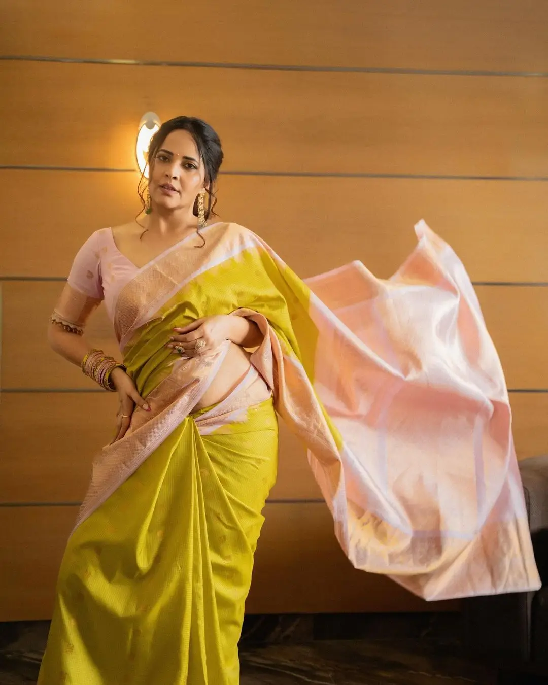 Anasuya Bharadwaj Wearing Beautiful Earrings Bangles Green Saree